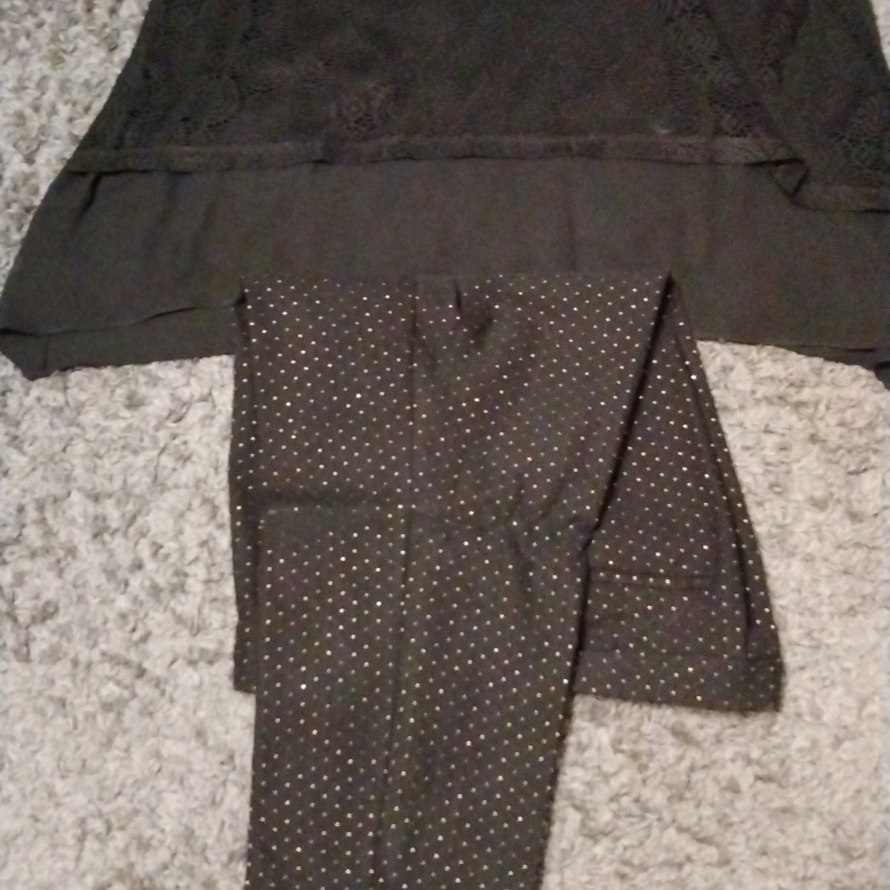 Black Shirt  18/20 W with 18 W black and Gold pants